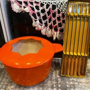 MCM orange cast iron fondue pot